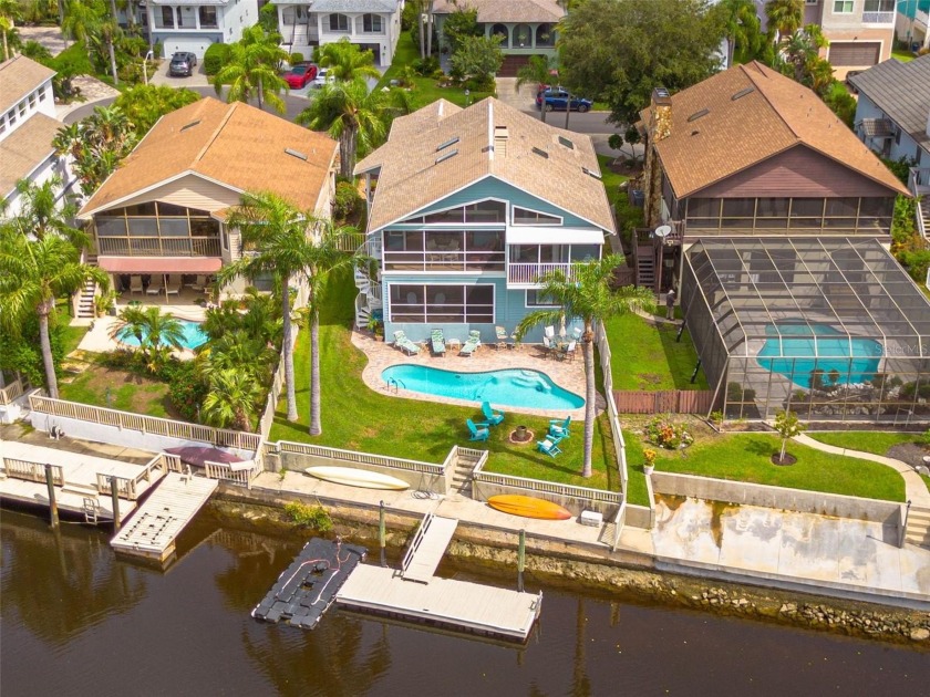 This Custom designed and engineered coastal home backs up to - Beach Home for sale in New Port Richey, Florida on Beachhouse.com