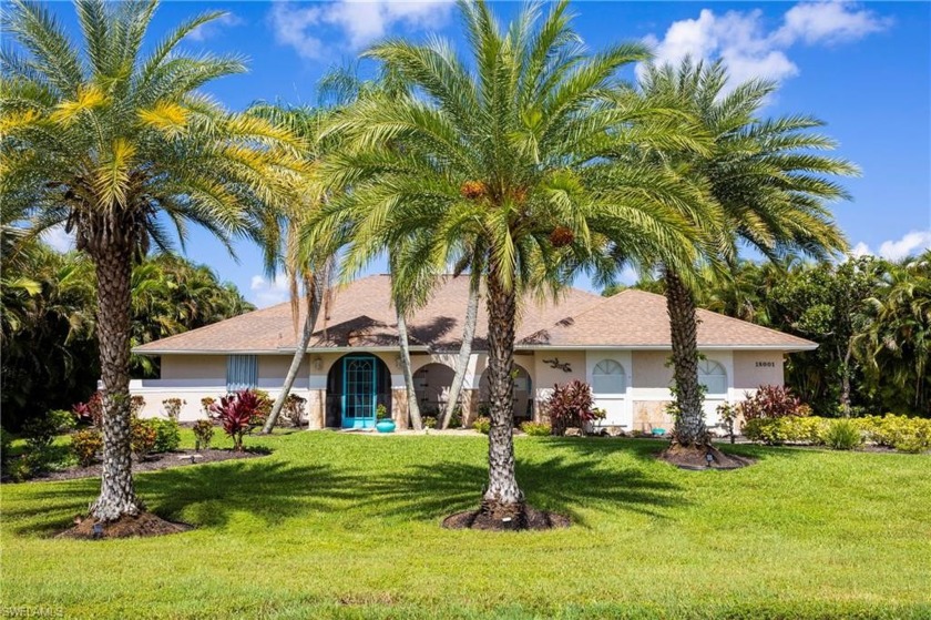Experience the serene and peaceful views of the long lake and - Beach Home for sale in Naples, Florida on Beachhouse.com