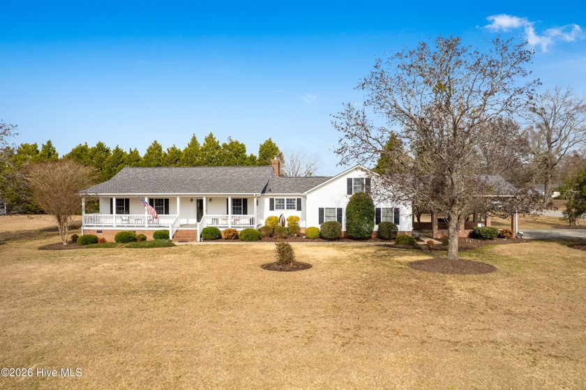Situated on a spacious corner lot just minutes from charming - Beach Home for sale in Hertford, North Carolina on Beachhouse.com
