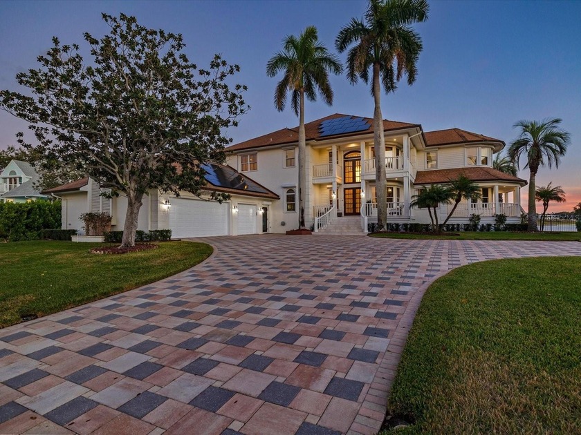 This private, world-class waterfront estate owned by the family - Beach Home for sale in Belleair Beach, Florida on Beachhouse.com