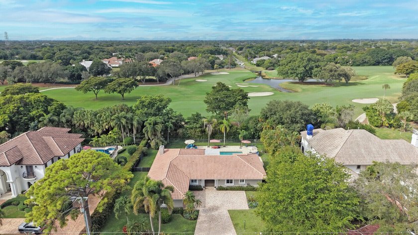 Situated on a nearly half-acre, fully fenced lot in a quiet - Beach Home for sale in Boynton Beach, Florida on Beachhouse.com