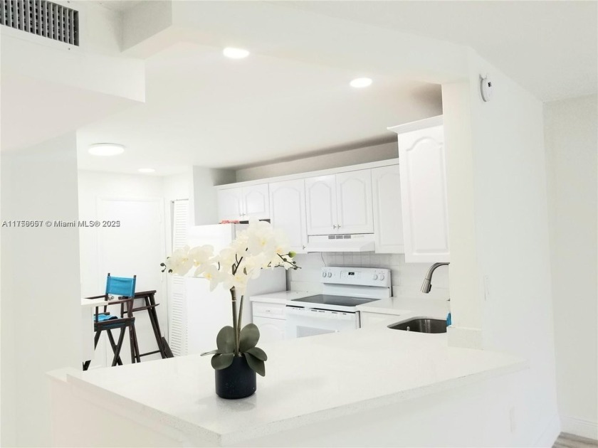 Tastefully remodeled 1/1.5 bath, plus den that can be converted - Beach Condo for sale in Miami, Florida on Beachhouse.com