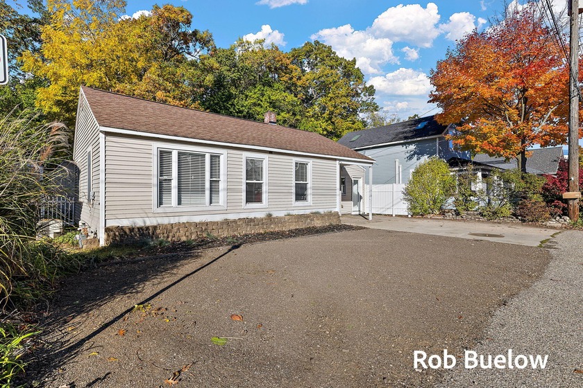 Welcome to this beautifully maintained ranch located in the - Beach Home for sale in Spring Lake, Michigan on Beachhouse.com