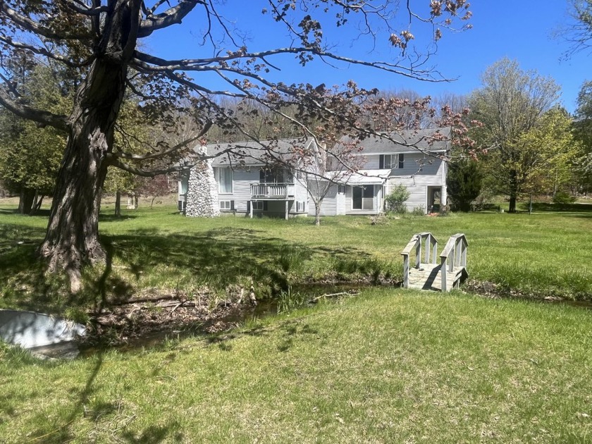 Opportunity abounds! This property features over two acres, a - Beach Home for sale in Manistee, Michigan on Beachhouse.com