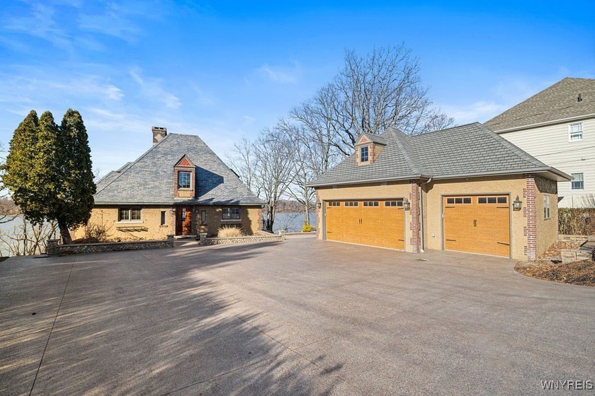 Experience refined waterfront living in this stunning French - Beach Home for sale in Youngstown, New York on Beachhouse.com