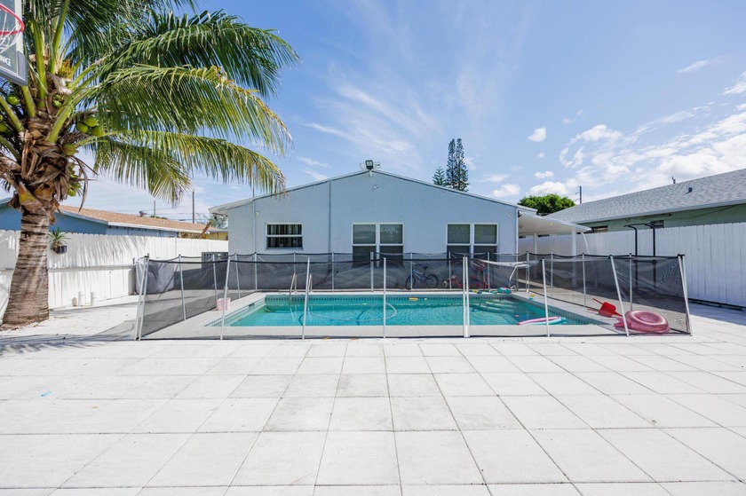 A home where memories are made.Spacious pool home featuring - Beach Home for sale in West Palm Beach, Florida on Beachhouse.com