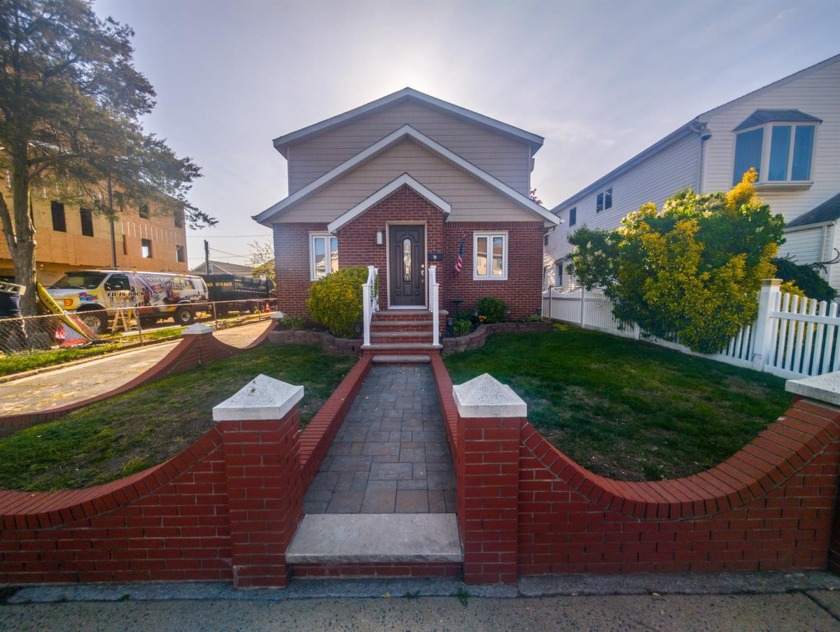 Welcome to this fabulous and well maintained brick colonial in - Beach Home for sale in Island Park, New York on Beachhouse.com