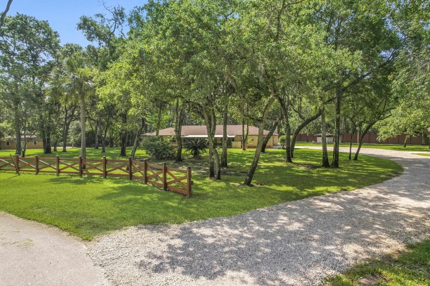 Tucked Away On Nearly 2.5 Acres Just 10 Miles From The Beach And - Beach Home for sale in St Augustine, Florida on Beachhouse.com