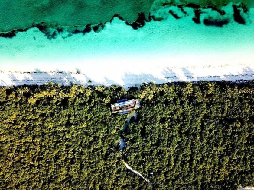 A true private tropical paradise.  This eco-sustainable villa - Beach Home for sale in Tulum,  on Beachhouse.com