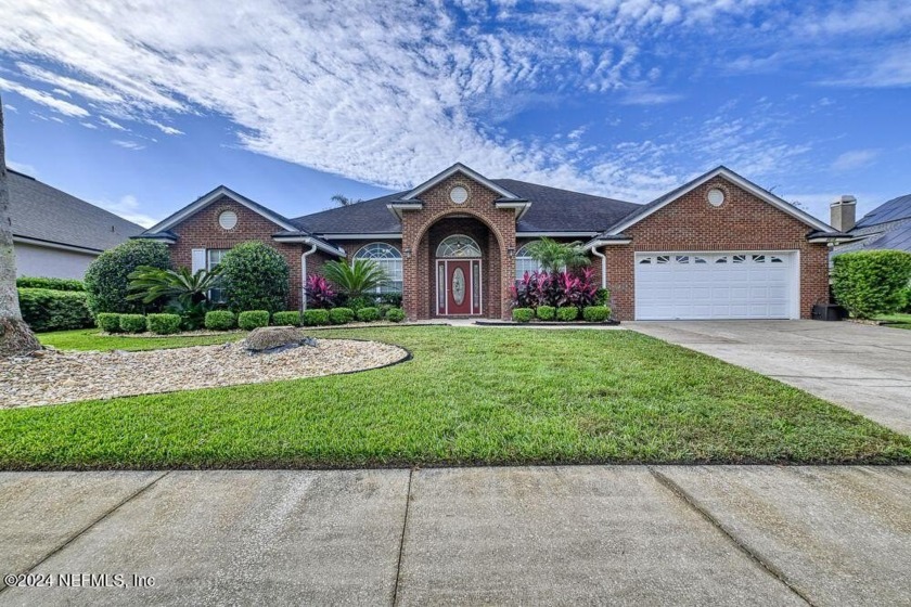 Discover your stunning all-brick residence nestled in the - Beach Home for sale in Fleming Island, Florida on Beachhouse.com