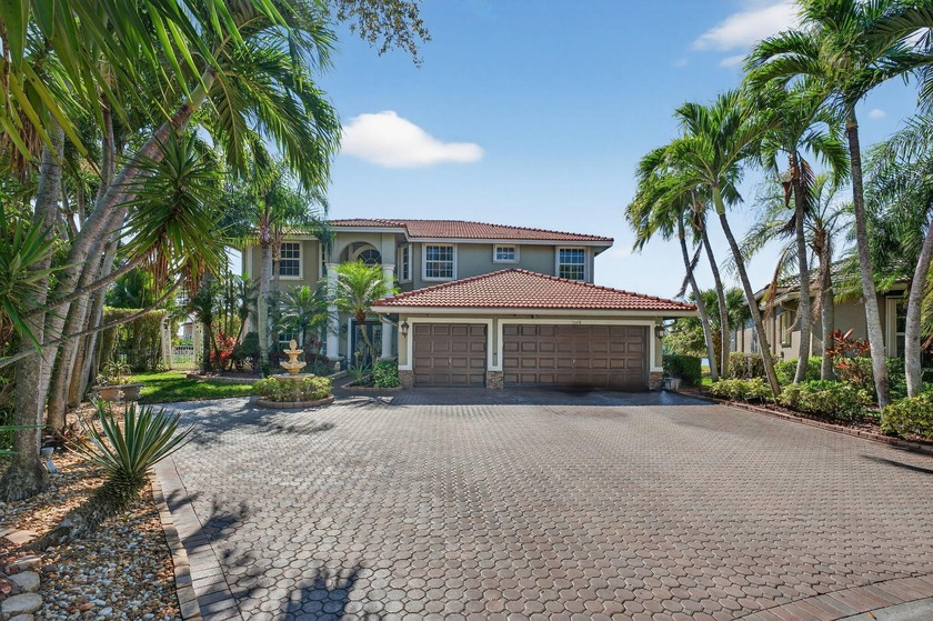 Discover unmatched privacy in the gated sanctuary of Pelican - Beach Home for sale in Coral Springs, Florida on Beachhouse.com