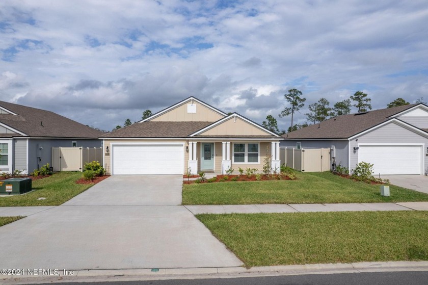 Welcome to this stunning, nearly new home located in the - Beach Home for sale in Yulee, Florida on Beachhouse.com