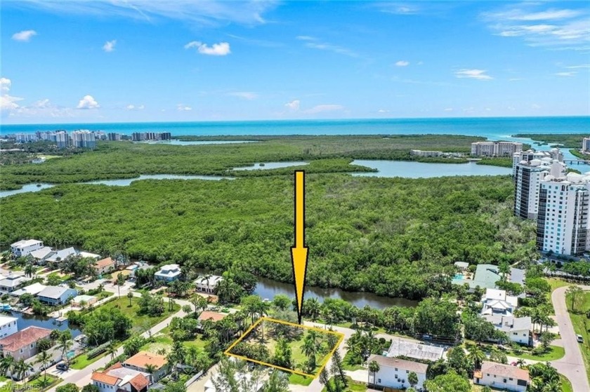 Step back in time to a WATERFRONT NEIGHBORHOOD that genuinely - Beach Lot for sale in Naples, Florida on Beachhouse.com