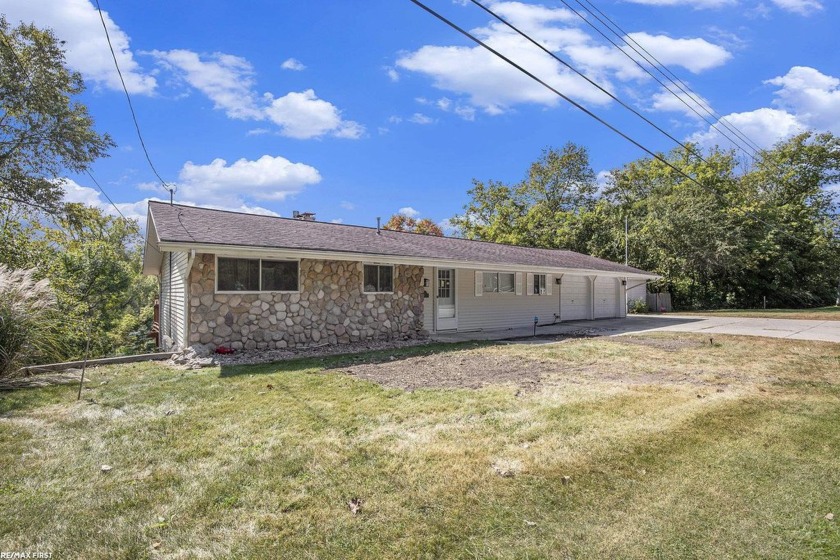 Welcome to 4167 N River Rd, a fully updated 4-bedroom, 3 - Beach Home for sale in Fort Gratiot, Michigan on Beachhouse.com