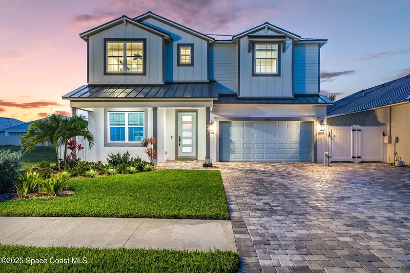 Embrace modern coastal living in this 2023-built home w/ metal - Beach Home for sale in Satellite Beach, Florida on Beachhouse.com