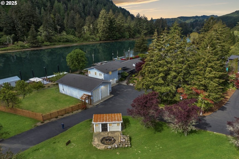 Experience the best of riverfront living in this beautifully - Beach Home for sale in Florence, Oregon on Beachhouse.com