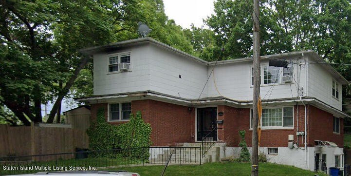 EXPERIENCE THE EXCEPTIONAL CHARM AND CHARACTER OF THIS STUNNING - Beach Home for sale in Staten Island, New York on Beachhouse.com