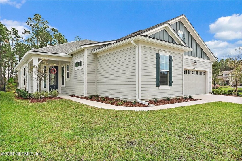 This stunning two-story home offers the ideal blend of comfort - Beach Home for sale in Saint Johns, Florida on Beachhouse.com