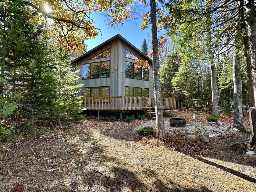 Experience the ultimate lakefront lifestyle in this beautiful - Beach Home for sale in Cheboygan, Michigan on Beachhouse.com