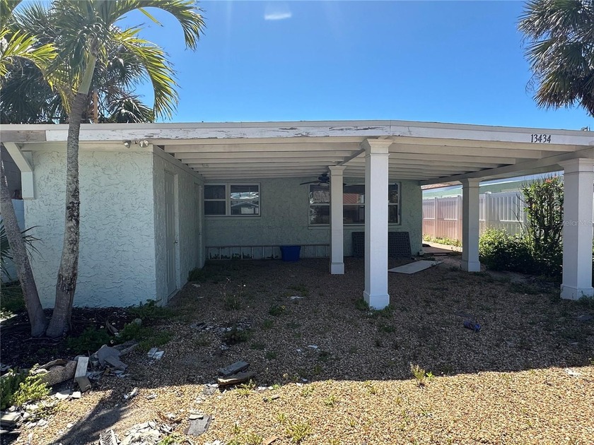Short Sale. Prime location just steps from the sand--this 4 bed - Beach Home for sale in Madeira Beach, Florida on Beachhouse.com