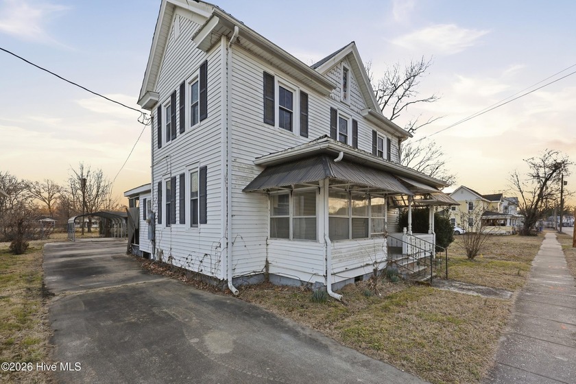 Charming 1902 4-bedroom, 2-bath home full of character and - Beach Home for sale in Hertford, North Carolina on Beachhouse.com