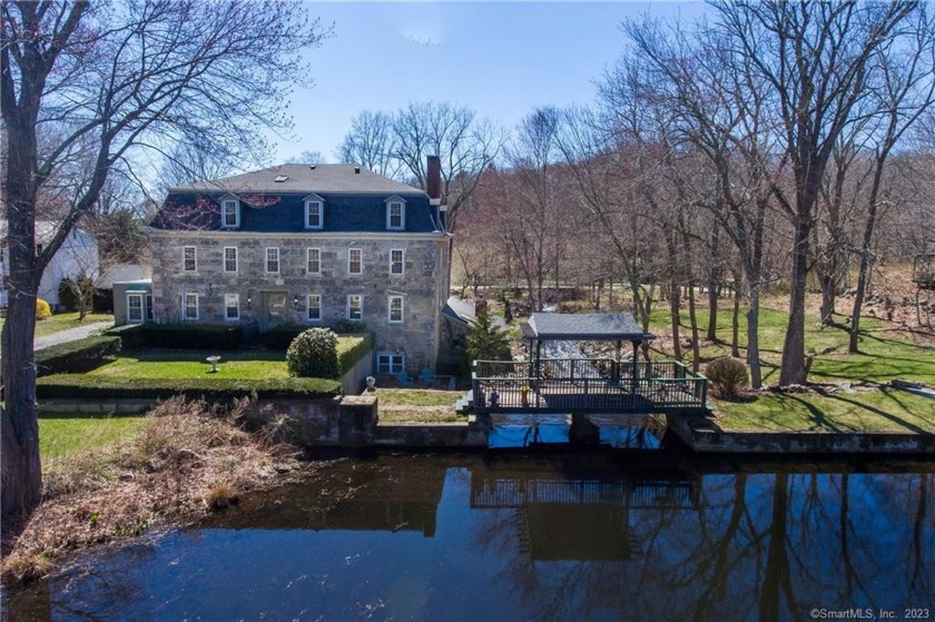 The iconic stone mill on Sill Lane is not only a centerpiece of - Beach Home for sale in Old Lyme, Connecticut on Beachhouse.com