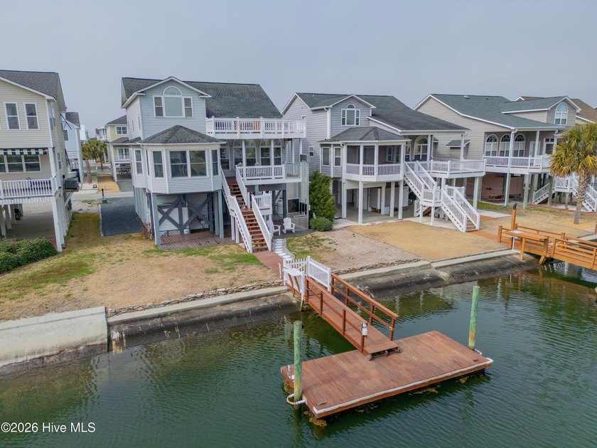 This is the canal home buyers wait for. Perfectly positioned on - Beach Home for sale in Ocean Isle Beach, North Carolina on Beachhouse.com
