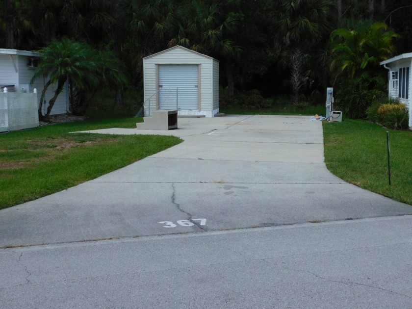 Perfectly priced, this RV site has a 75' x 21' concrete driveway - Beach Lot for sale in Titusville, Florida on Beachhouse.com