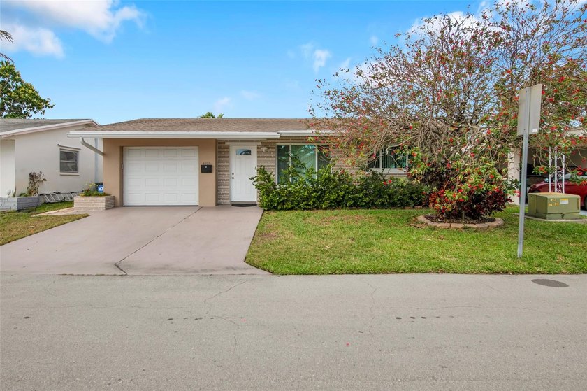 Come see this gorgeous home in Mainland 55+ community. This home - Beach Home for sale in Tamarac, Florida on Beachhouse.com