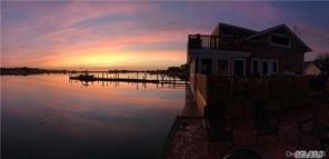 Experience the ultimate in coastal living with this - Beach Home for sale in Center Moriches, New York on Beachhouse.com