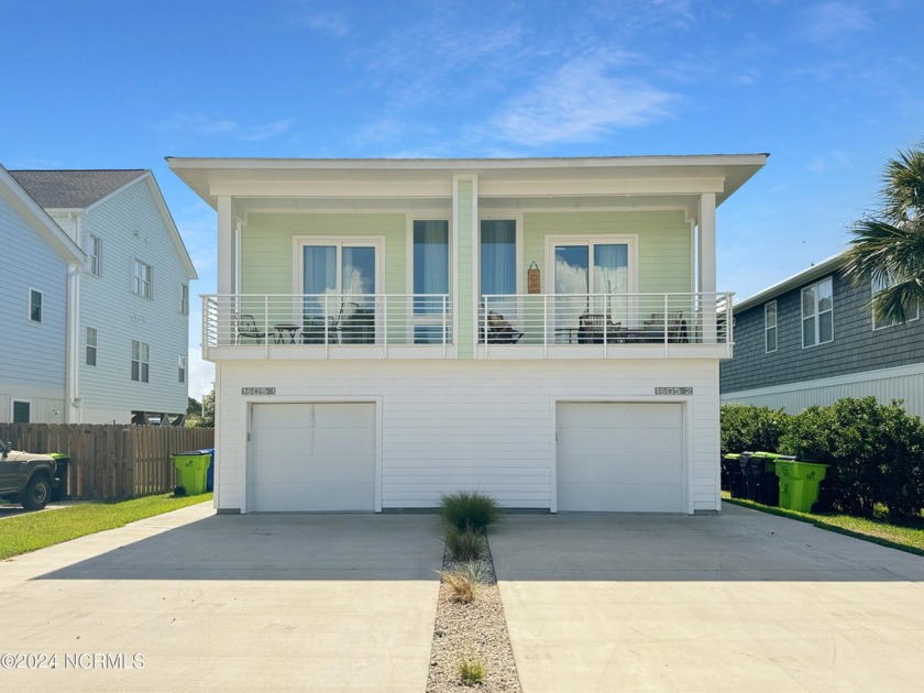 Welcome to 1605 Pinfish Lane, an exquisite home that surpasses - Beach Townhome/Townhouse for sale in Carolina Beach, North Carolina on Beachhouse.com