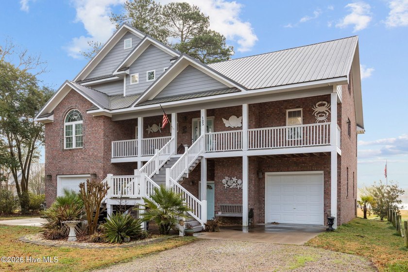 Welcome to your gorgeously landscaped coastal oasis -- where - Beach Home for sale in Belhaven, North Carolina on Beachhouse.com
