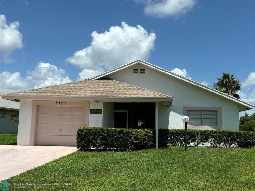 Free standing single family Waterfront home in the gated - Beach Home for sale in West Palm Beach, Florida on Beachhouse.com