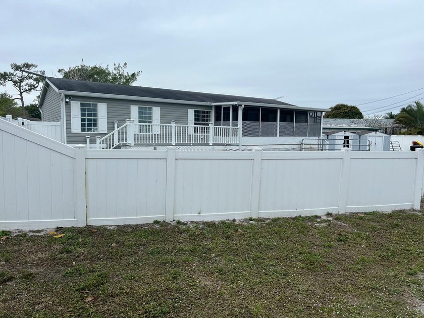 Large manufactured home on a large corner lot. NO HOA - YOU OWN - Beach Home for sale in Stuart, Florida on Beachhouse.com