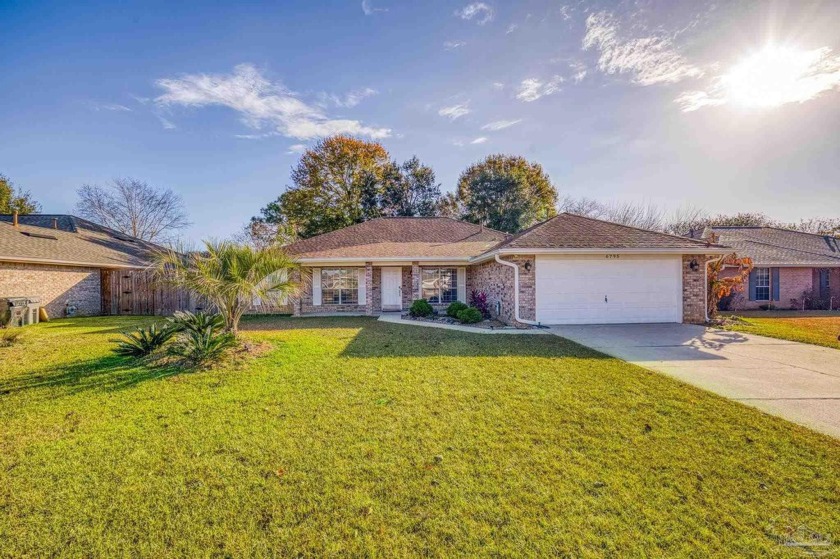 Welcome to this beautifully designed 4-bedroom, 2-bathroom brick - Beach Home for sale in Pensacola, Florida on Beachhouse.com