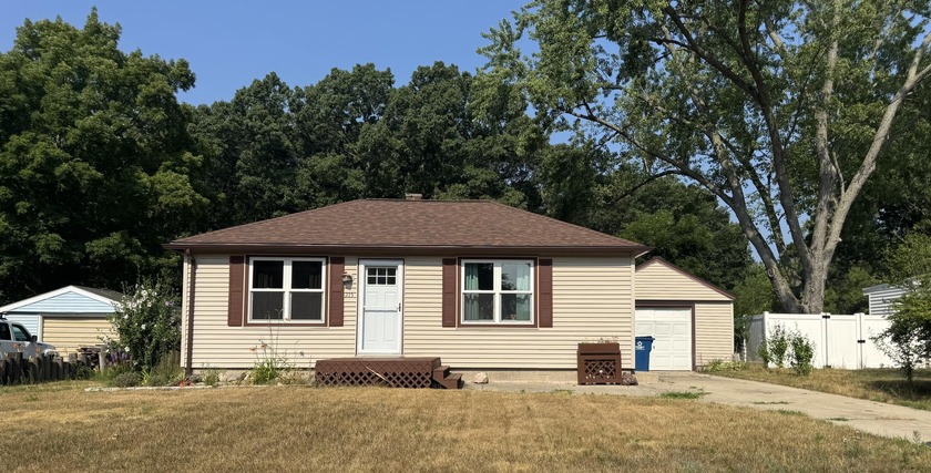 Welcome to the village of Spring Lake! This home is located on a - Beach Home for sale in Spring Lake, Michigan on Beachhouse.com