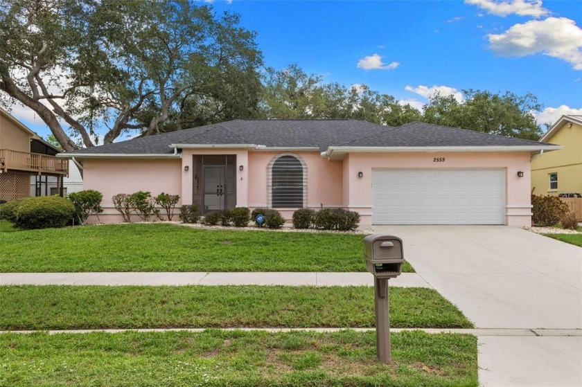 Welcome to your dream home at 2559 Wood Oak Drive, nestled in - Beach Home for sale in Sarasota, Florida on Beachhouse.com