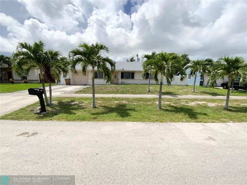 Don't miss out on this expansive 4-bedroom, 3-bathroom home - Beach Home for sale in Deerfield Beach, Florida on Beachhouse.com