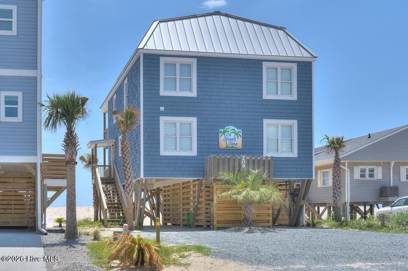 Experience refined coastal living with proven income performance - Beach Home for sale in Oak Island, North Carolina on Beachhouse.com