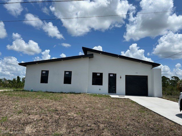NEW CONSTRUCTION!! Fully impact doors and windows, gorgeous home - Beach Home for sale in Lehigh Acres, Florida on Beachhouse.com