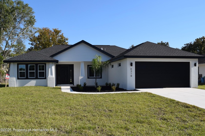 Brand NEW 3/2/2 home built with pride by the owner; a - Beach Home for sale in Spring Hill, Florida on Beachhouse.com