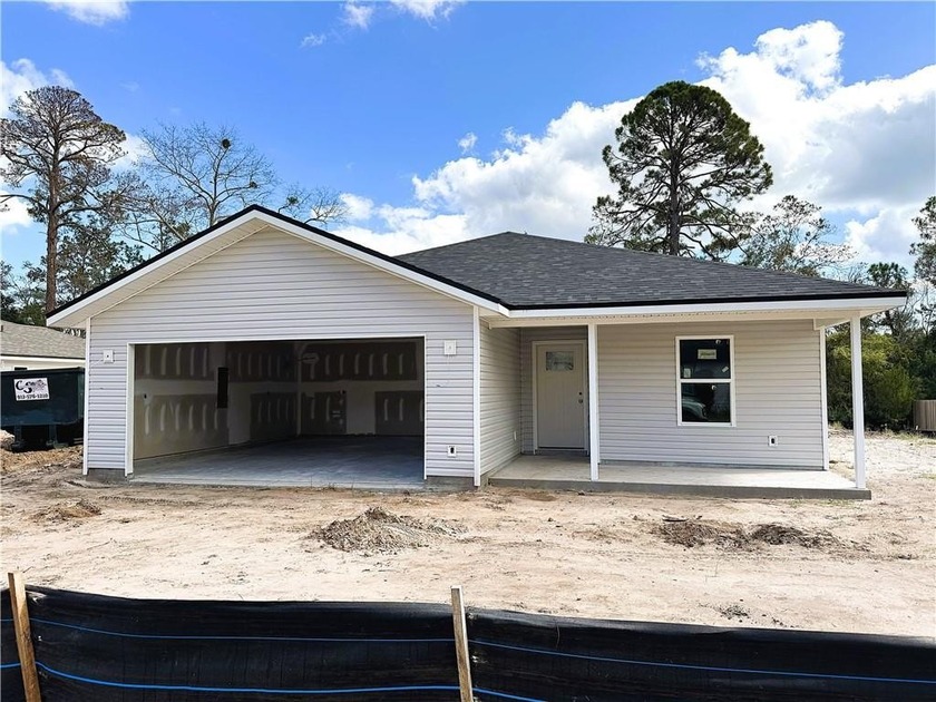 UNDER CONSTRUCTION WITH A SCHEDULED DECEMBER COMPLETION!  THIS - Beach Home for sale in Saint Marys, Georgia on Beachhouse.com