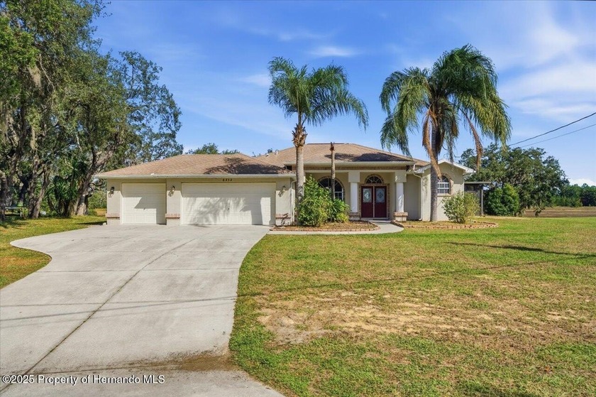 4/3/3 pool home with 2086 living sq. ft. Oversized 1/2 acre lot - Beach Home for sale in Spring Hill, Florida on Beachhouse.com