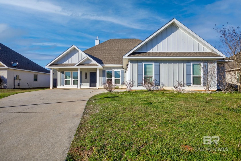 Welcome home to this captivating 4-bed, 3-bath craftsman nestled - Beach Home for sale in Daphne, Alabama on Beachhouse.com