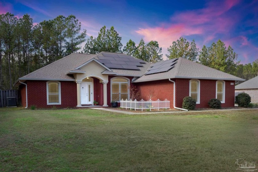 Welcome to this charming coastal brick home with a 2-car garage - Beach Home for sale in Milton, Florida on Beachhouse.com