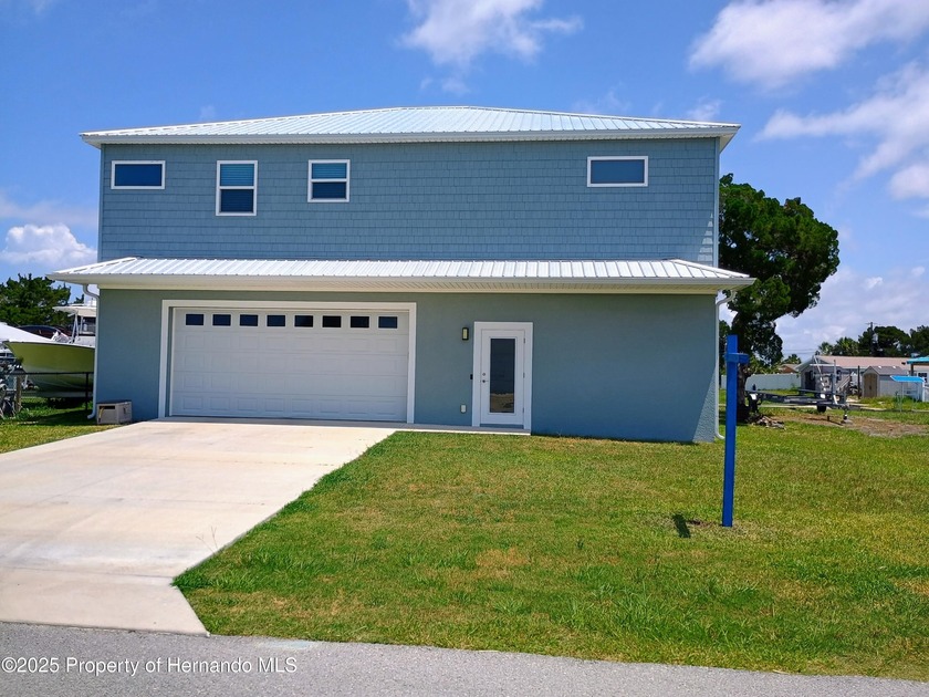 NO CDD OR HOA FEES!!! DISCOVER THIS 2023 THREE BEDROOM HOME IN - Beach Home for sale in Hernando Beach, Florida on Beachhouse.com