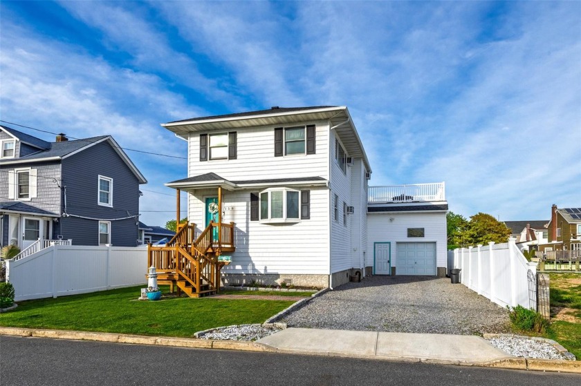 Welcome to this Charming Canal-Front Colonial with Bay Views - 

 - Beach Home for sale in Babylon, New York on Beachhouse.com