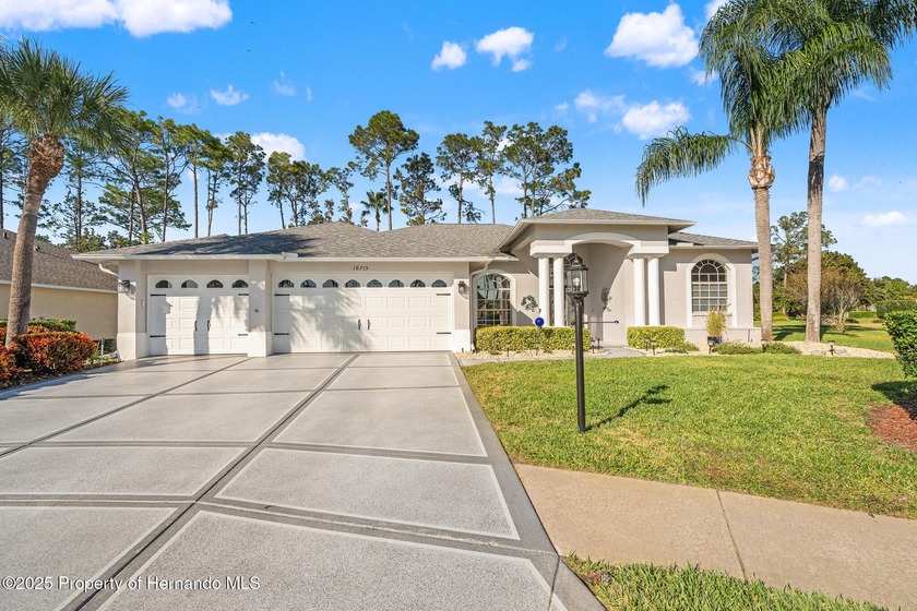 Experience luxury living in the highly sought-after, 55+ gated - Beach Home for sale in Hudson, Florida on Beachhouse.com