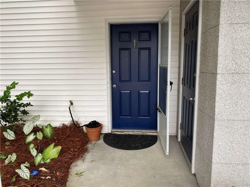 Experience the charm of island living in this beautifully - Beach Condo for sale in Saint Simons, Georgia on Beachhouse.com