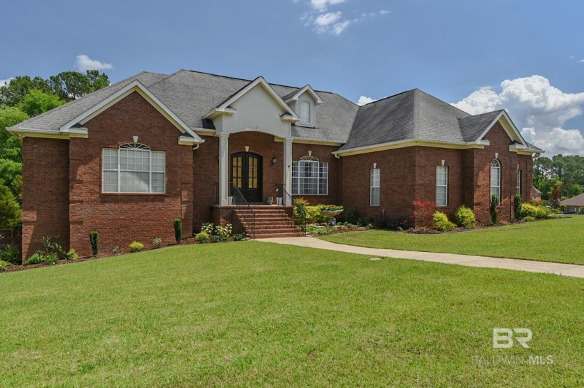 This custom brick home in the sought after Stillwater - Beach Home for sale in Spanish Fort, Alabama on Beachhouse.com